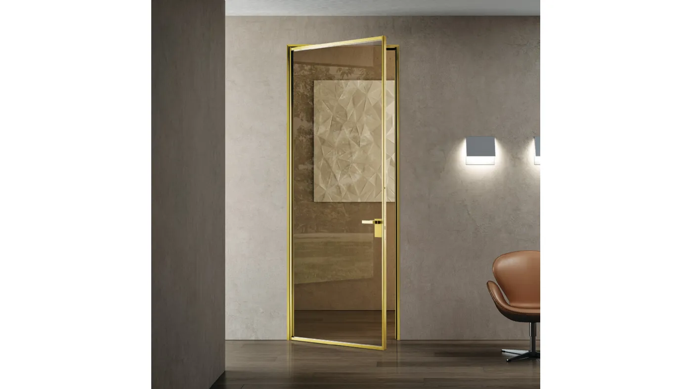 porte di design a battente in vetro e alluminio Bertolotto Porte gold finitura oro