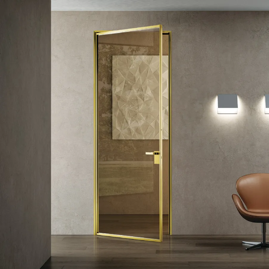 porte di design a battente in vetro e alluminio Bertolotto Porte gold finitura oro